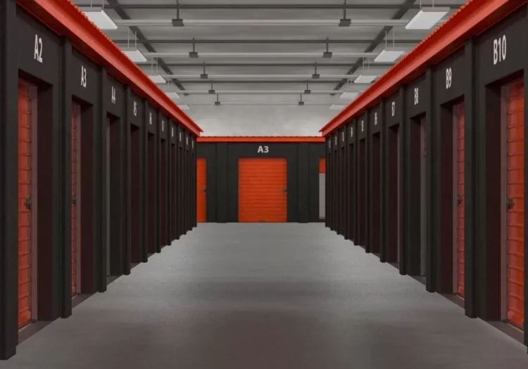 Guarda móveis no Centro Sul de BH: galeria fechada com várias portas de unidade de armazenamento.